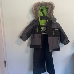 Brand new Oshkosh b’gosh 12m snowsuit with hat and neck warmer